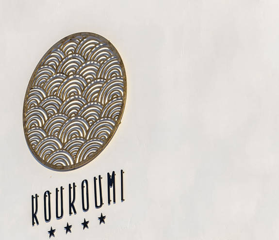 Koukoumi Vegan Hotel sign